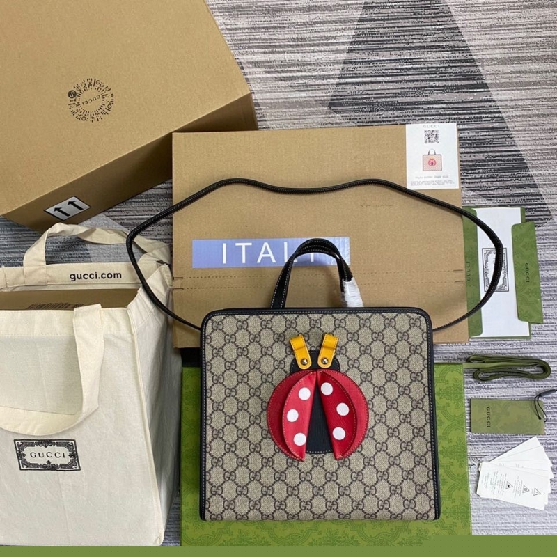 G*u*i shopping bags